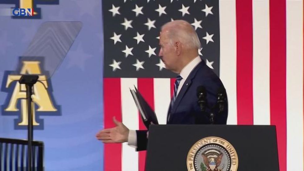 Joe Biden shakes hands with thin air and claims to have been 'full professor' in bizarre speech gaffe