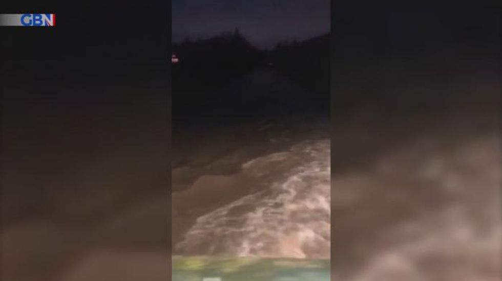 Storm Franklin batters Britain as rivers burst banks and 87pmh winds wreak havoc