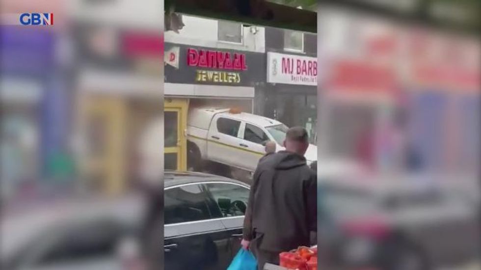 WATCH the staggering moment gang of armed raiders smash truck through jewellers in Birmingham