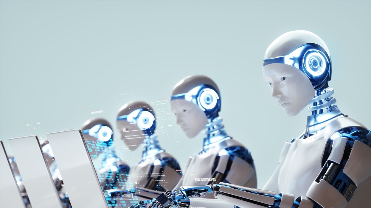 Digital generated image of multiple robots working on laptops
