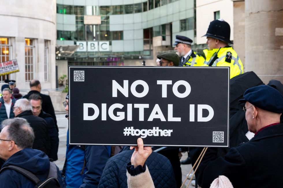Digital ID protest placard