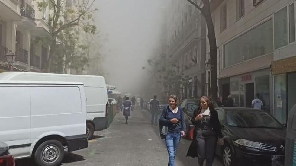 Madrid explosion sees smoke billow through city from three storey building
