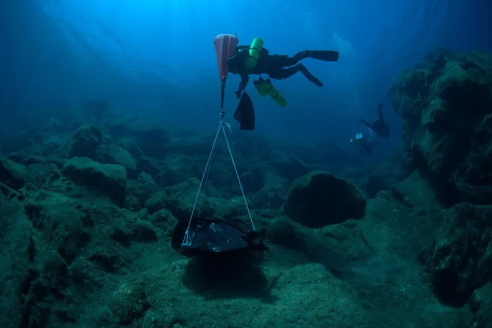Divers at Greece wreck
