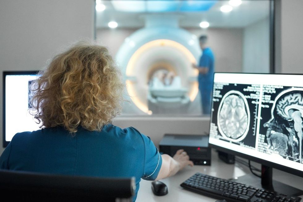 doctor checking mri scan