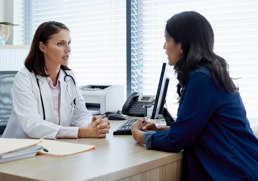 Doctor talking to patient