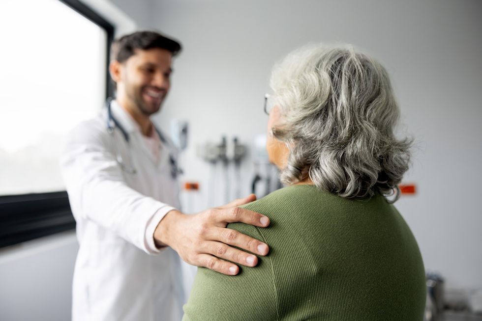 Doctor with senior female patient