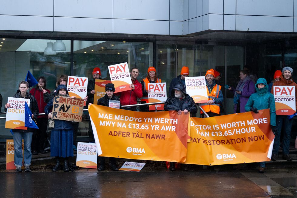 Doctors and supporters gather at the University Hospital of Wales