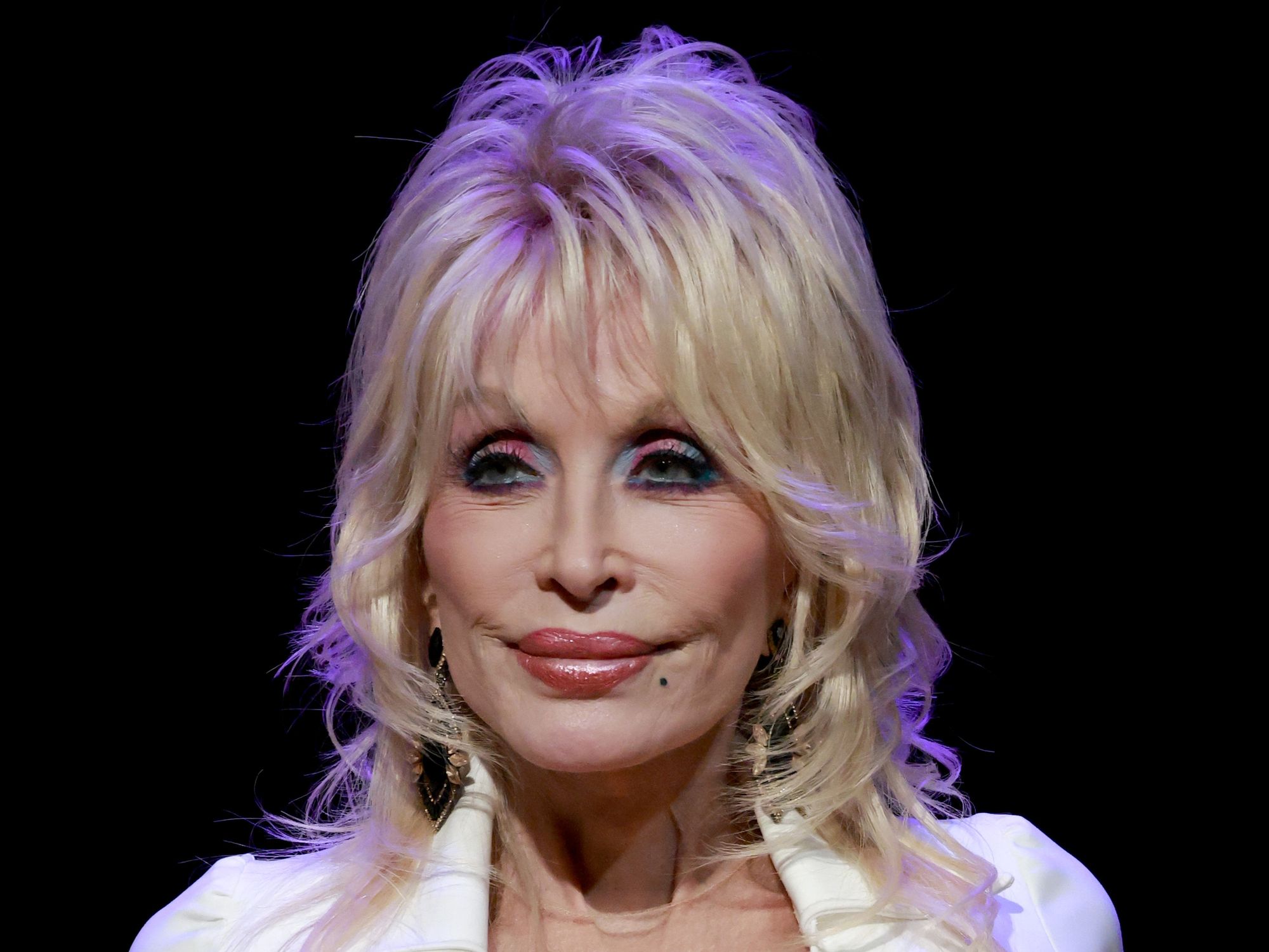 Dolly Parton, 79, supported by fans as she makes surprise first Dolly Parton, 79, supported by fans as she makes surprise first