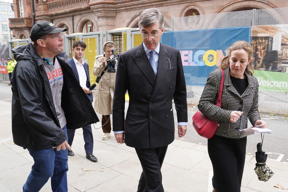 Dominic Hutchins shouts at Leader of the House of Commons, Jacob Rees Mogg as he enters the Conservative Party conference in Manchester today.