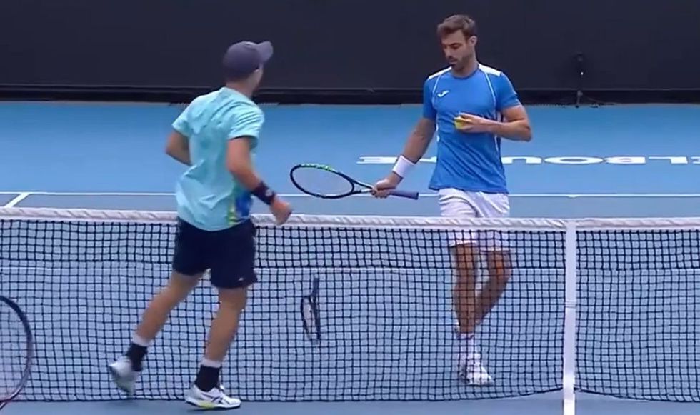 Dominik Koepfer tried throwing his racket to touch the ball