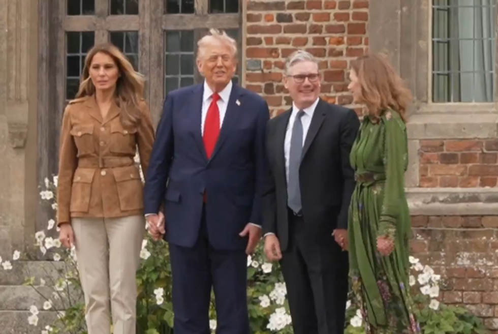 Donald and Melania Trump with Sir Keir Starmer and Lady Starmer watch parachute display