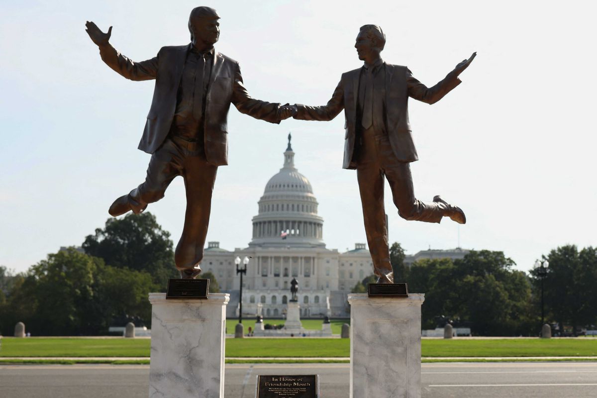 Donald Trump and Jeffrey Epstein holding hands statue
