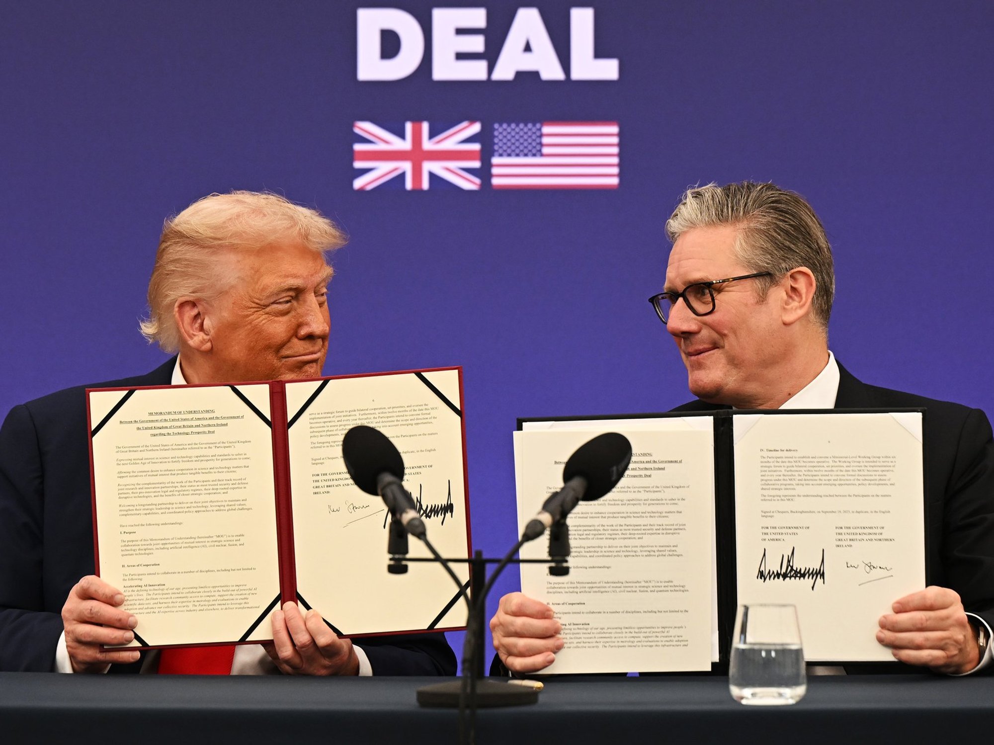 Donald Trump and Keir Starmer signing US-UK trade deal