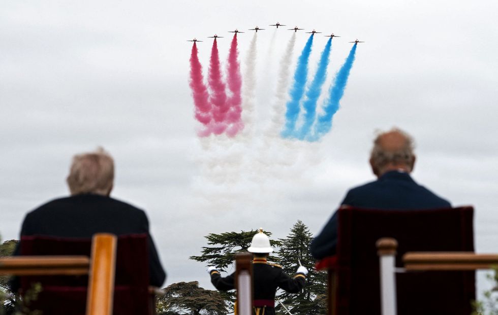 Donald Trump and King Charles III watch a Red Arrows fly-past