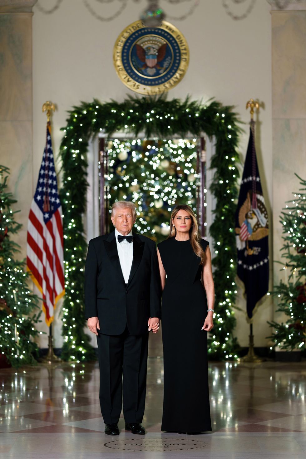 Donald Trump and Melania Trump pose for their Christmas portrati
