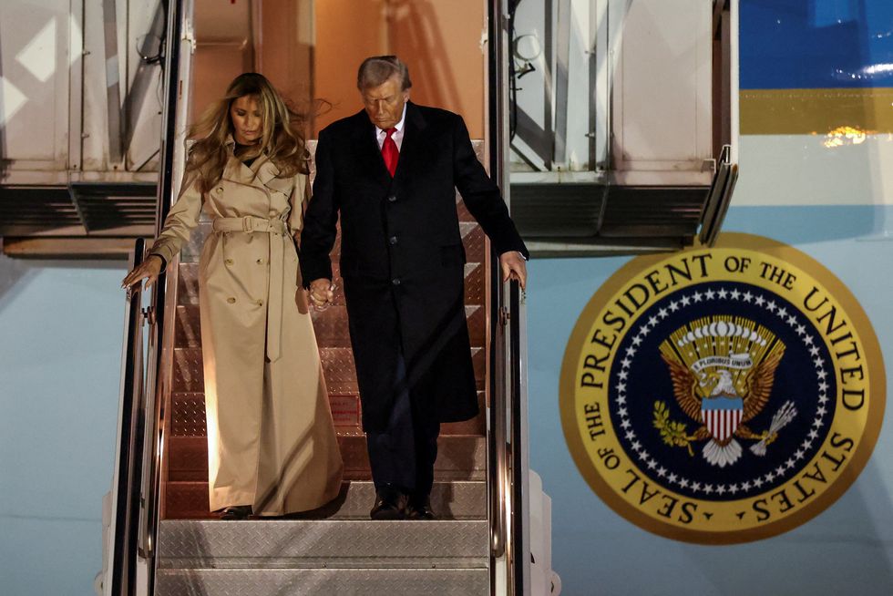 Donald Trump and wife Melania disembarking from Air Force One