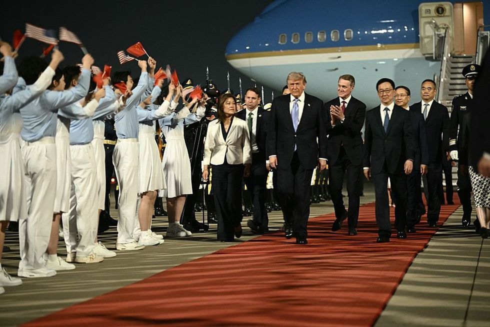 Donald Trump disembarks Air Force One on his visit in China