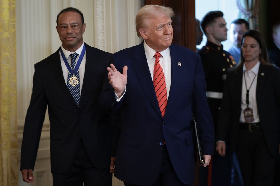 Donald Trump expressed his sorrow following the arrest of golf legend Tiger Woods, appearing unusually subdued when reporters approached him about the incident on Friday