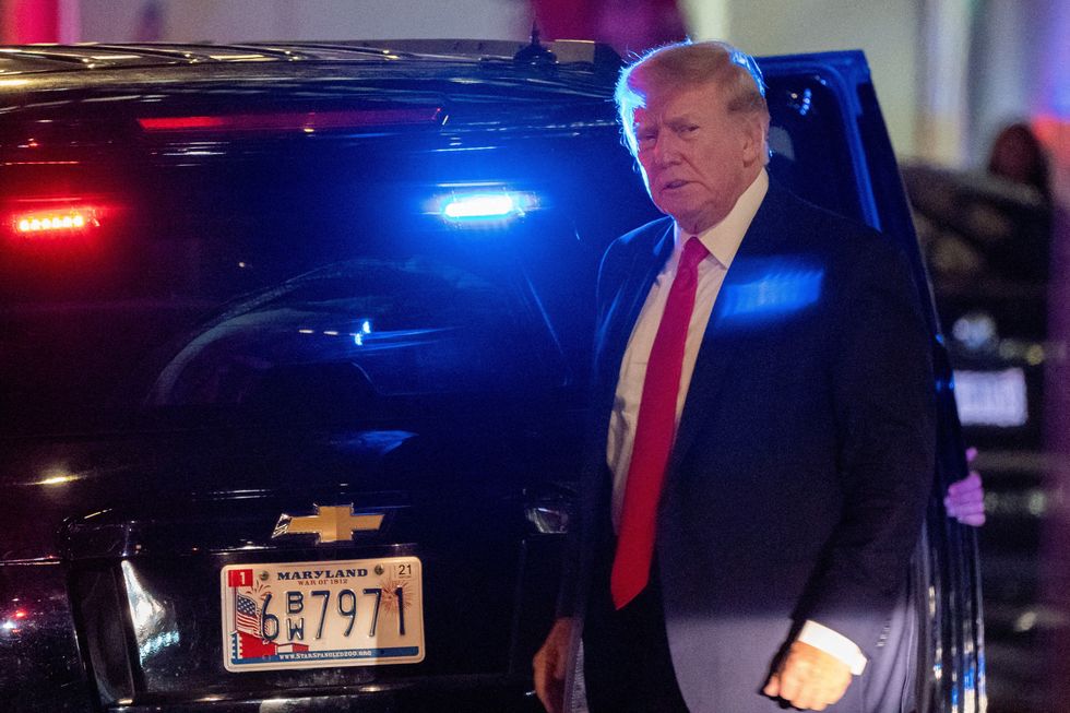 Donald Trump getting out of a car