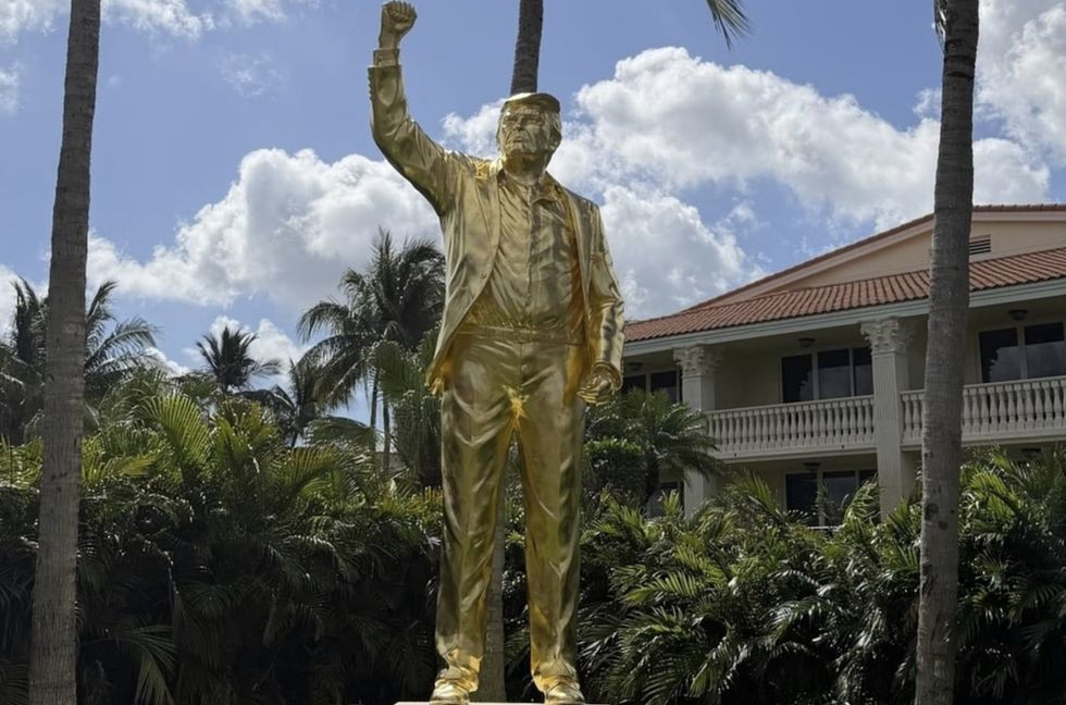Donald Trump has erected a 15-foot gold statue of himself