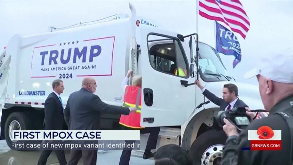 Trump gives speech from rubbish truck in bizarre stunt just days after 'garbage' controversy