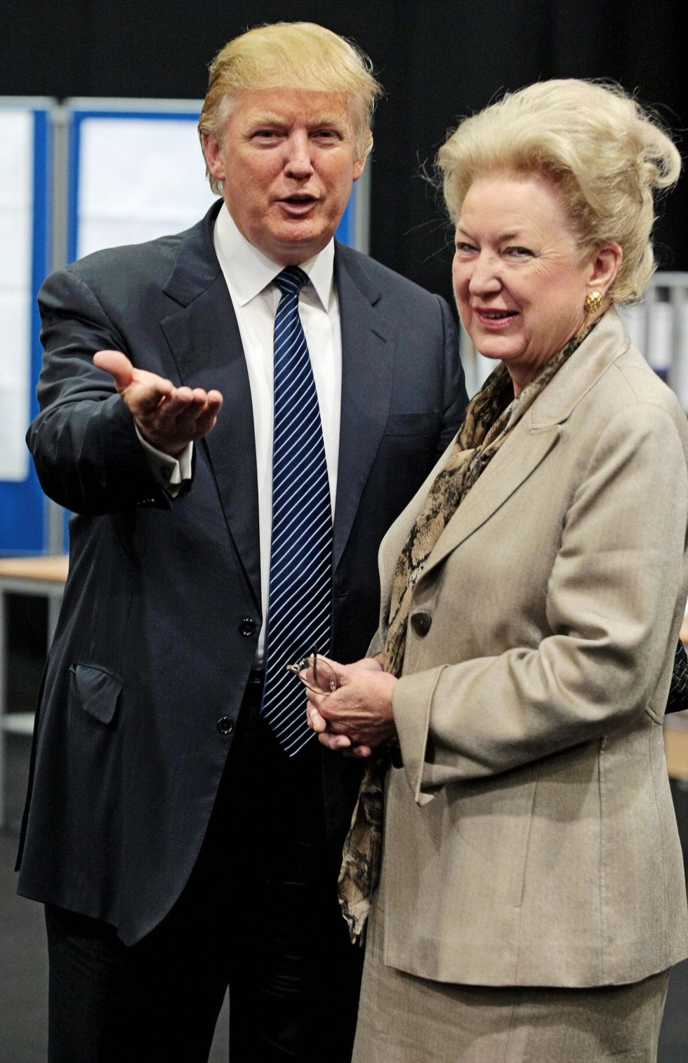 Donald Trump (L) is pictured with his sister Maryanne Trump Barry as they adjourn for lunch during a public inquiry over his plans to build a golf resort near Aberdeen