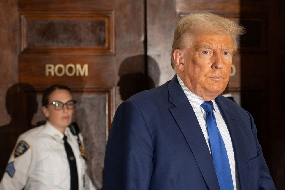 Donald Trump leaves his New York courtroom