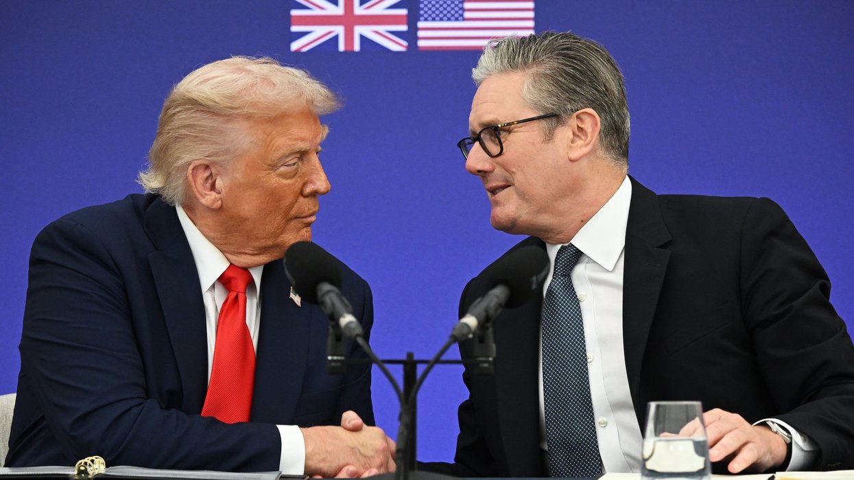 Donald Trump shakes hands with Sir Keir Starmer