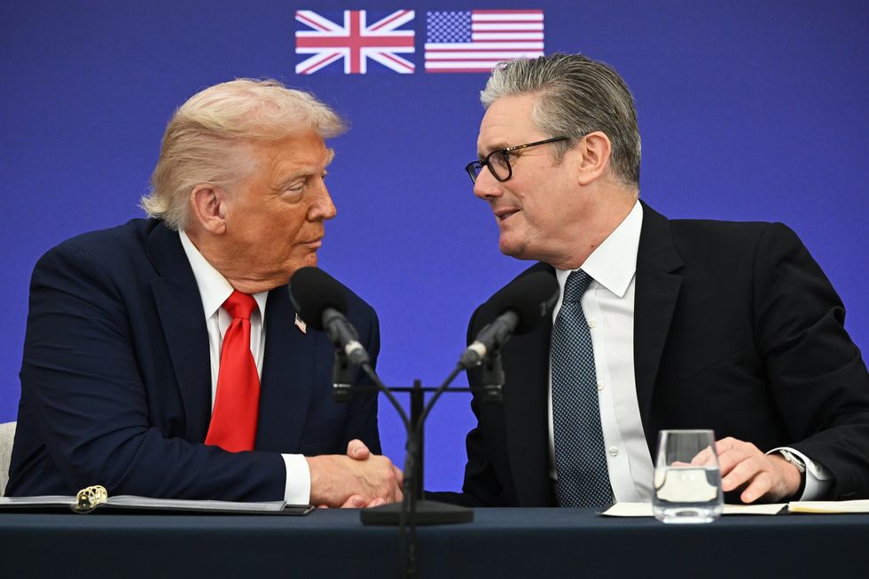 Donald Trump shakes hands with Sir Keir Starmer
