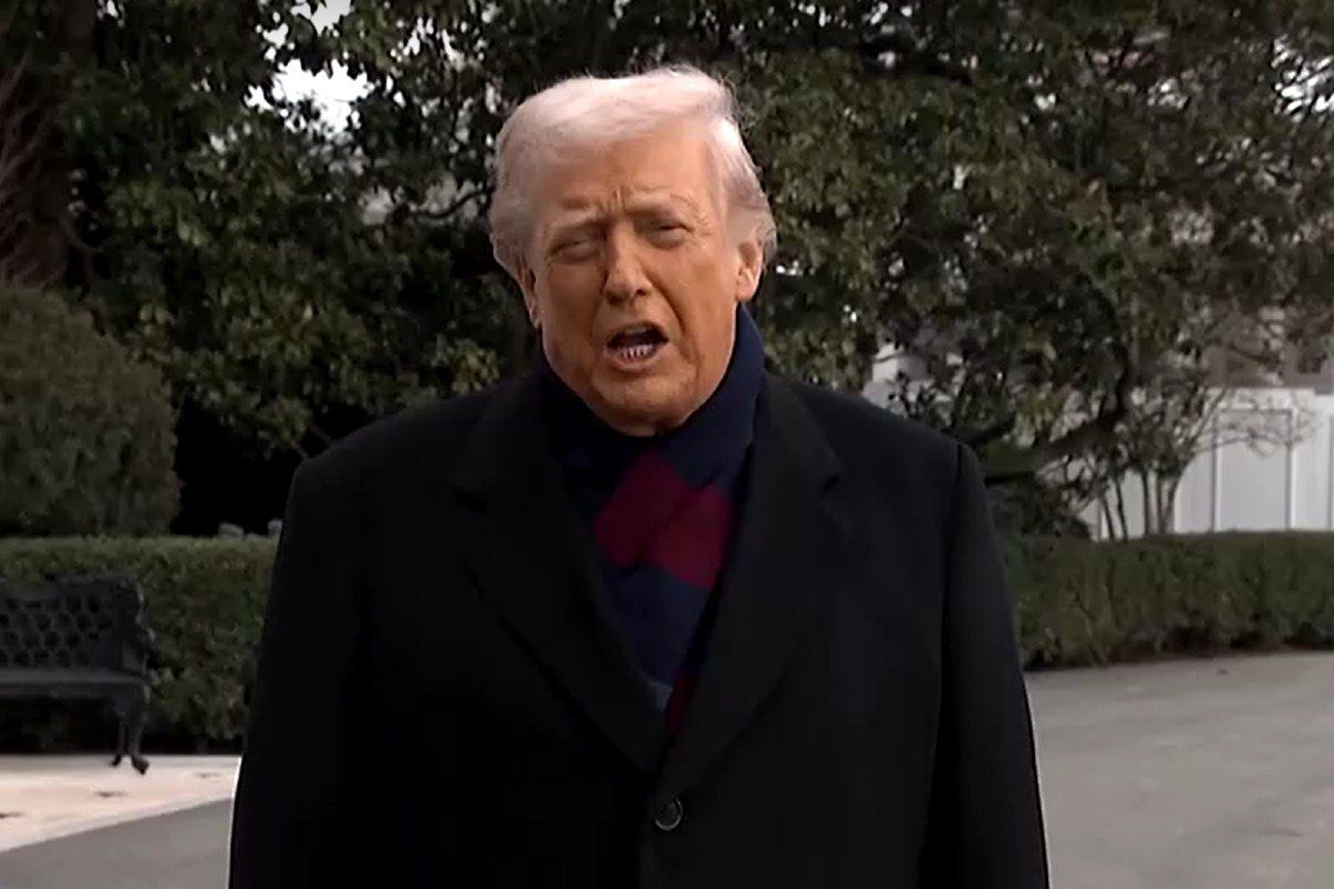 Donald Trump speaks to reporters outside White House