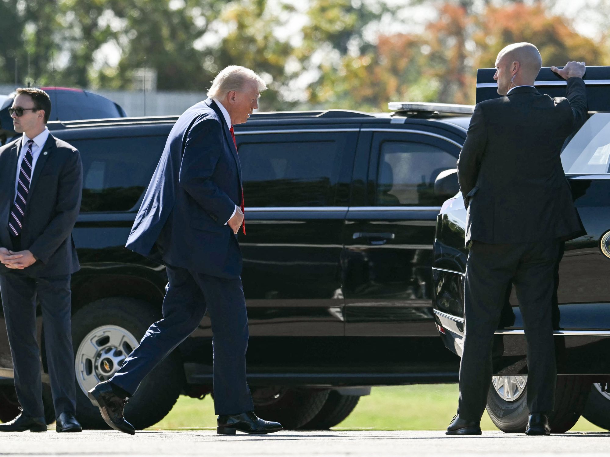 Donald Trump with vehicles