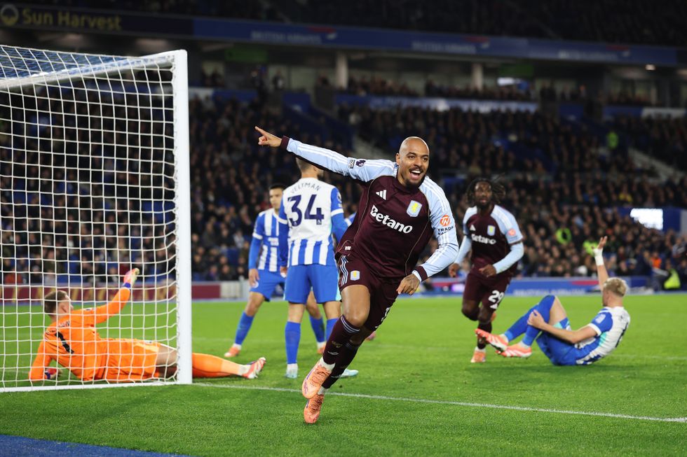 Donyell Malen of Aston Villa celebrates scoring his team's fourth goal