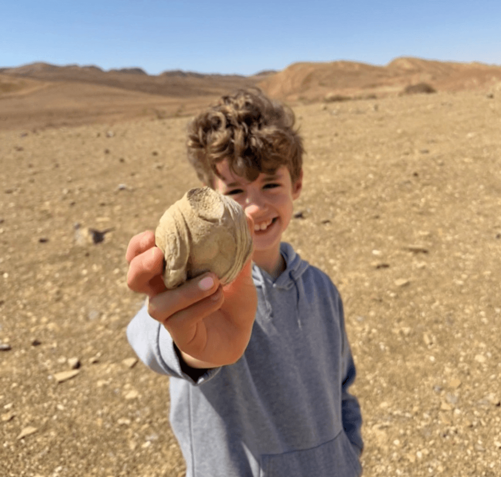 Dor Wolynitz on a family outing in the Ramon Crater region