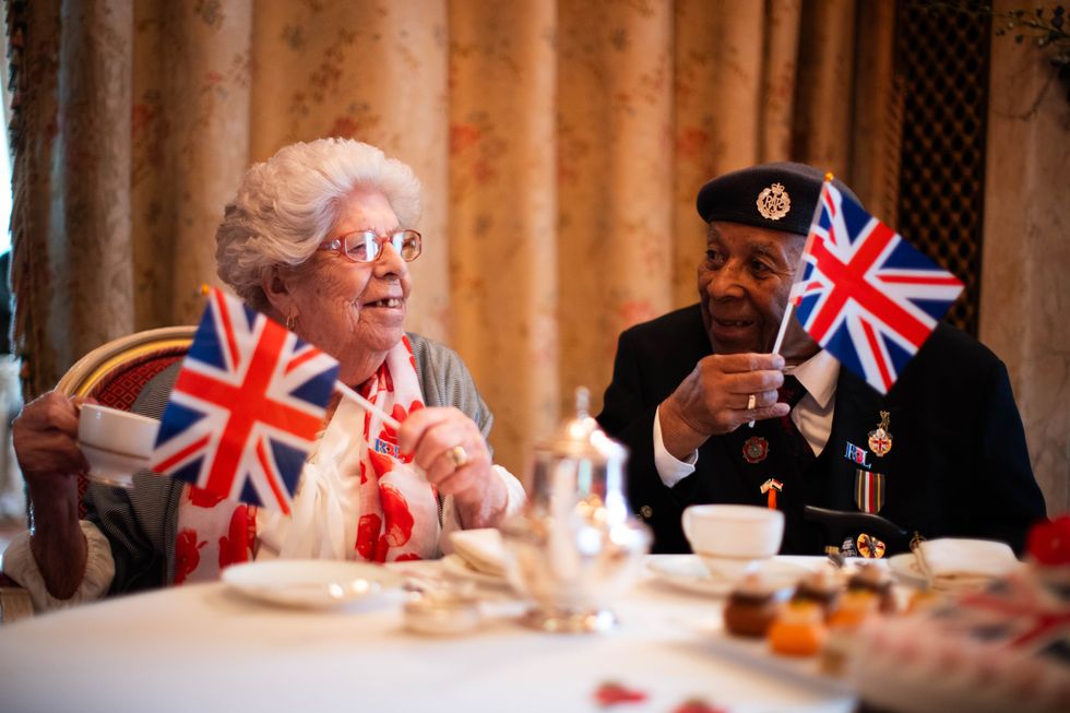 Doreen Mills, 96, and Gilbert Clarke, 98, join Second World War veterans at a tea party organized by the Royal British Legion at The Ritz