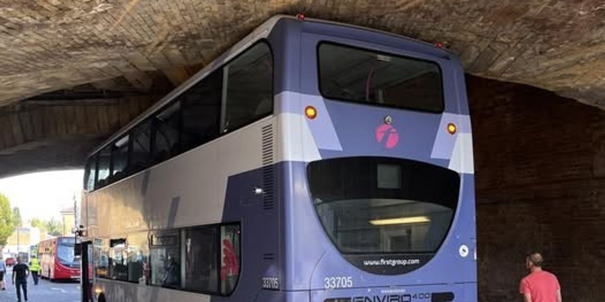 NextImg:Double-decker bus crashes into railway bridge as operator launches probe into collision