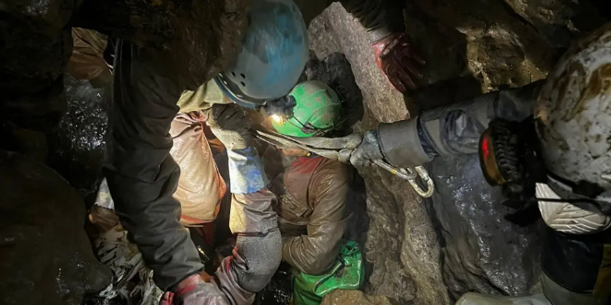 NextImg:Three men rescued from cave after being trapped for 30 hours by Storm Amy