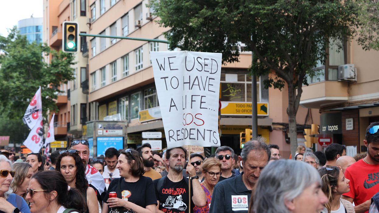 Dozens of people during a demonstration against tourist overcrowding and for decent housing