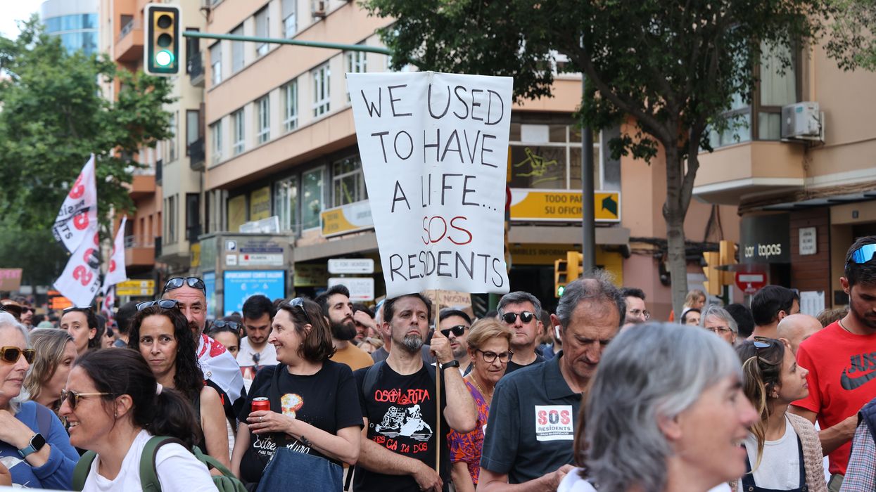 Dozens of people during a demonstration against tourist overcrowding and for decent housing