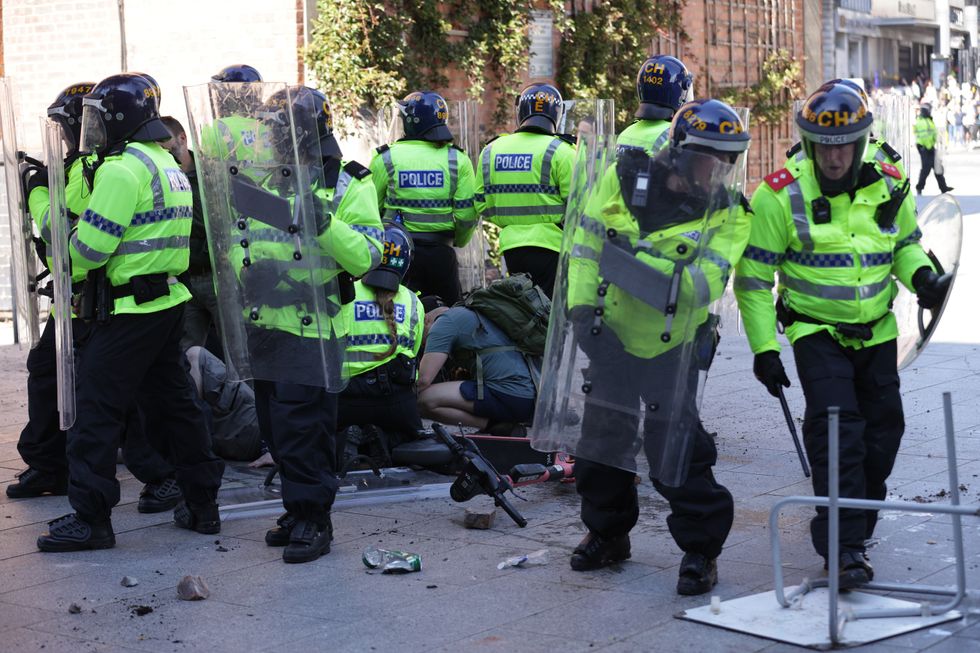 Dozens of police officers have been left injured during the violent protests