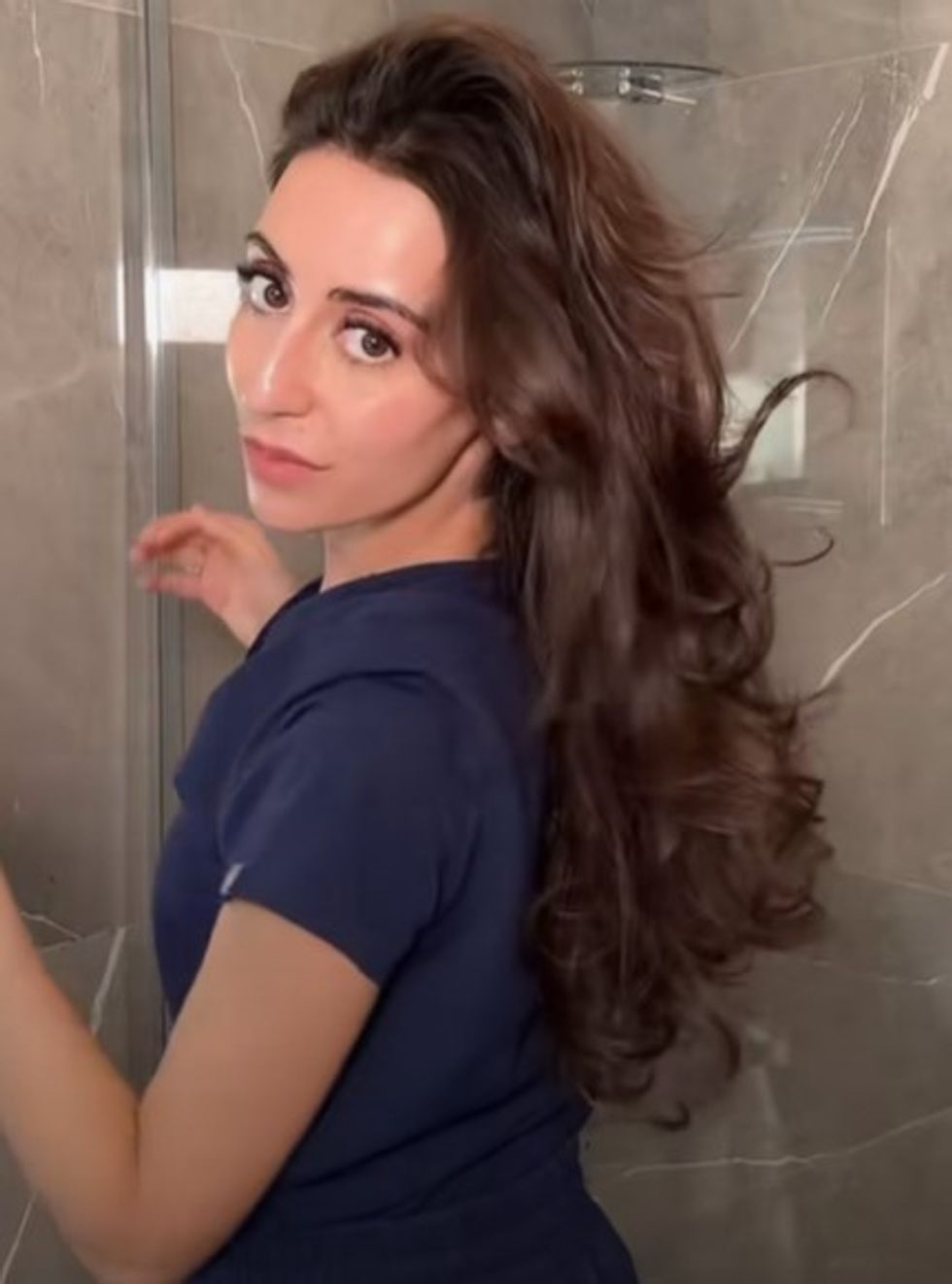 Dr Aamna Adel showing her successful hair growth