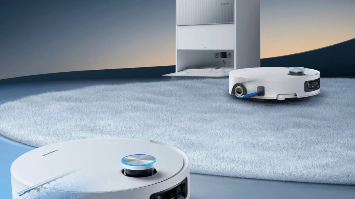 Dreame Aqua10 Ultra Roller Complete vacuum displayed vacuuming carpet