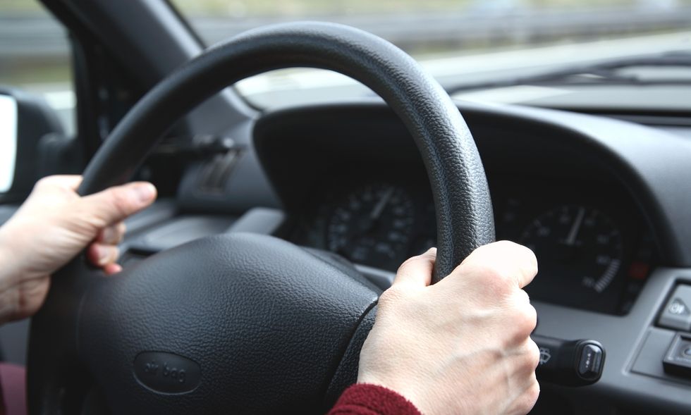 Driver at the wheel in car