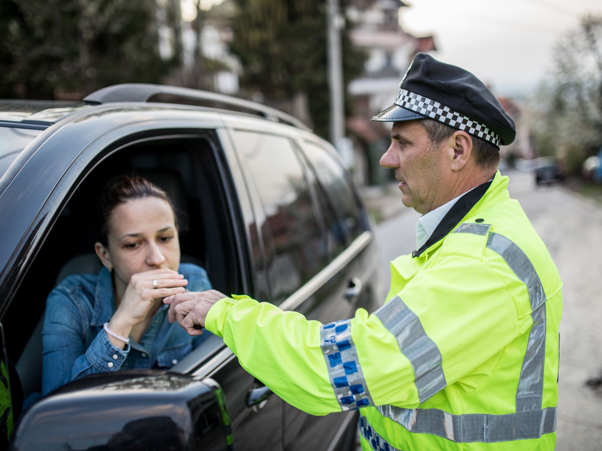 Driver being breathalysed by the police