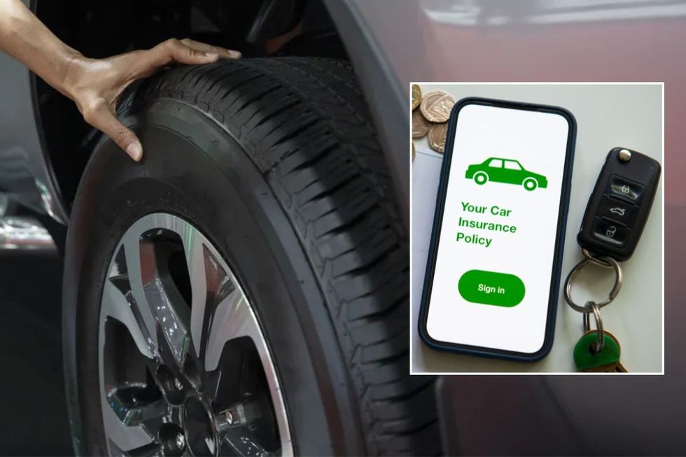 Driver checking a tyre and car insurance