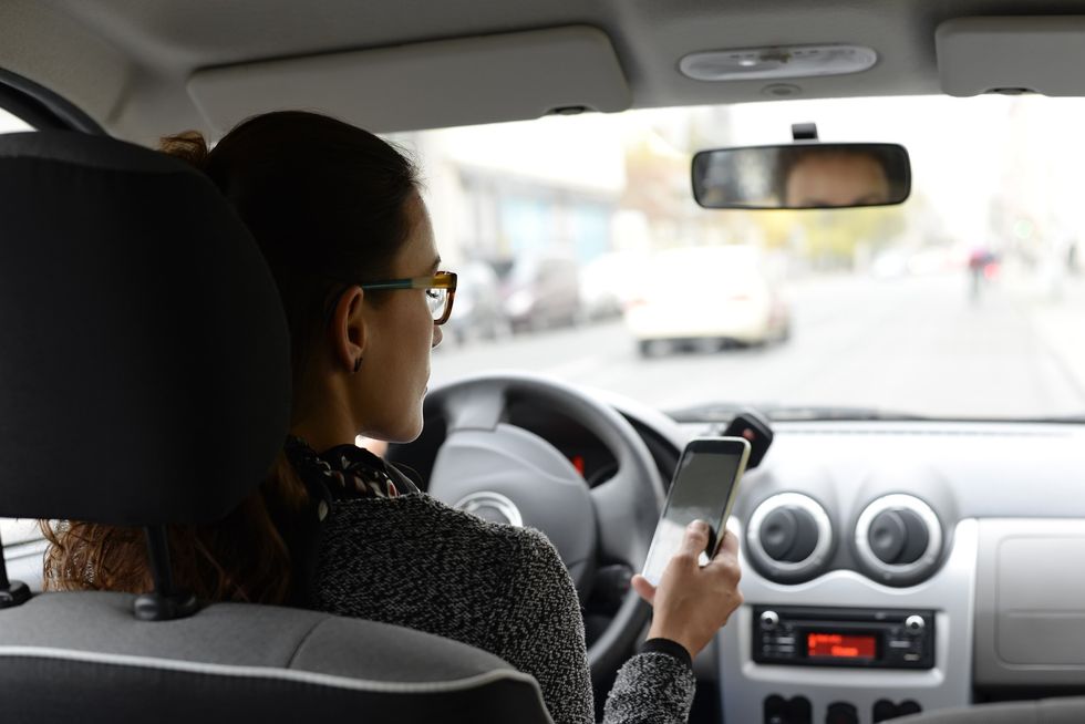 Driver using phone in car
