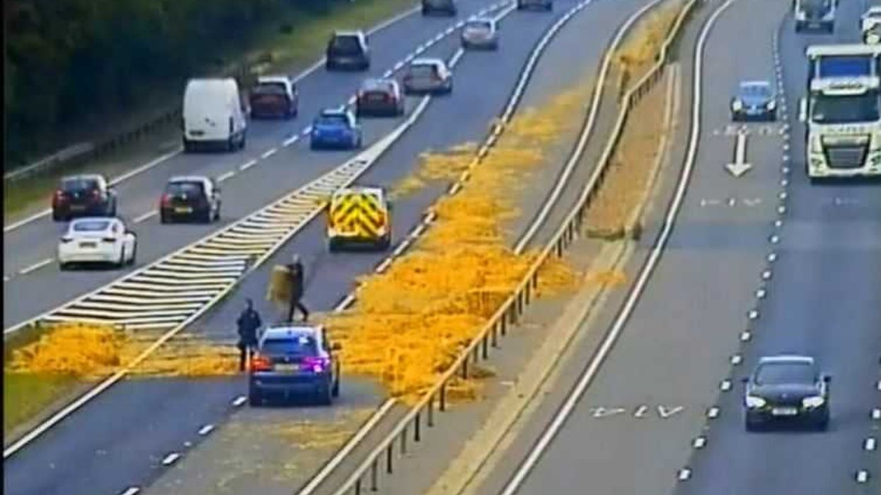 Drivers along the A14 are dealing with delays as hay bales cover the road 