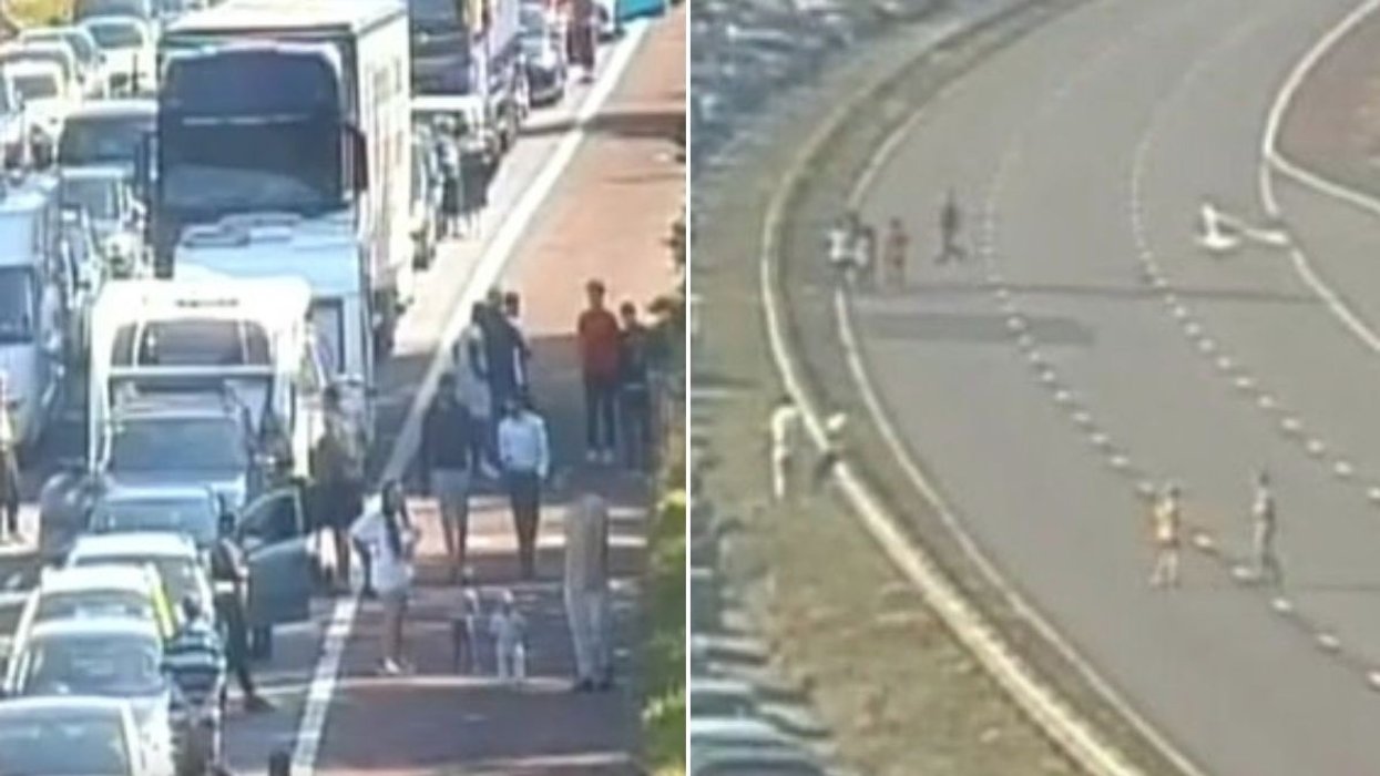 Drivers and pedestrians walking along the M6 during a police incident