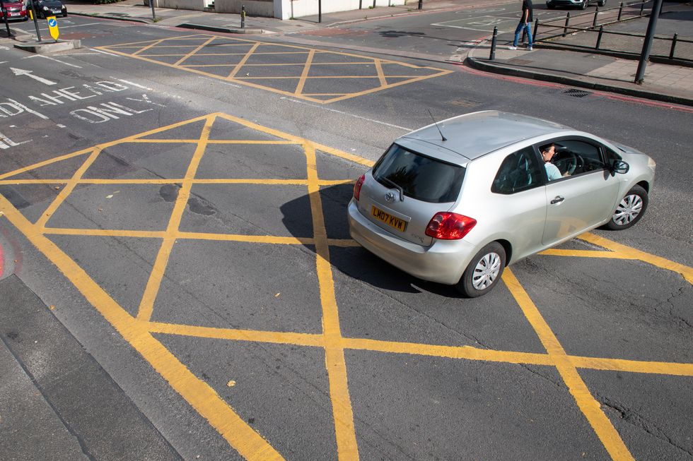 Drivers have to pay \u00a3160 if they stop in a yellow box and take longer than a fortnight to pay