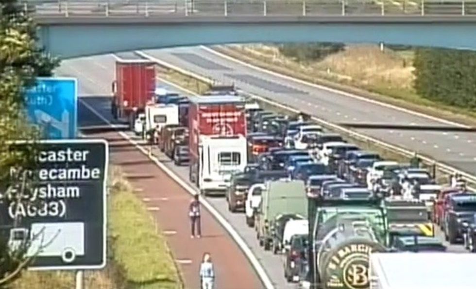 Drivers were seen wandering around on the motorway for extended periods of time