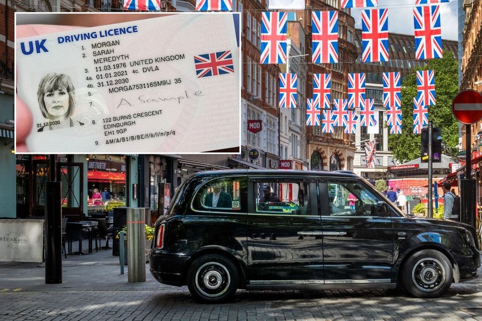 Driving licence and a black cab parked in front of Union Jack flags in London